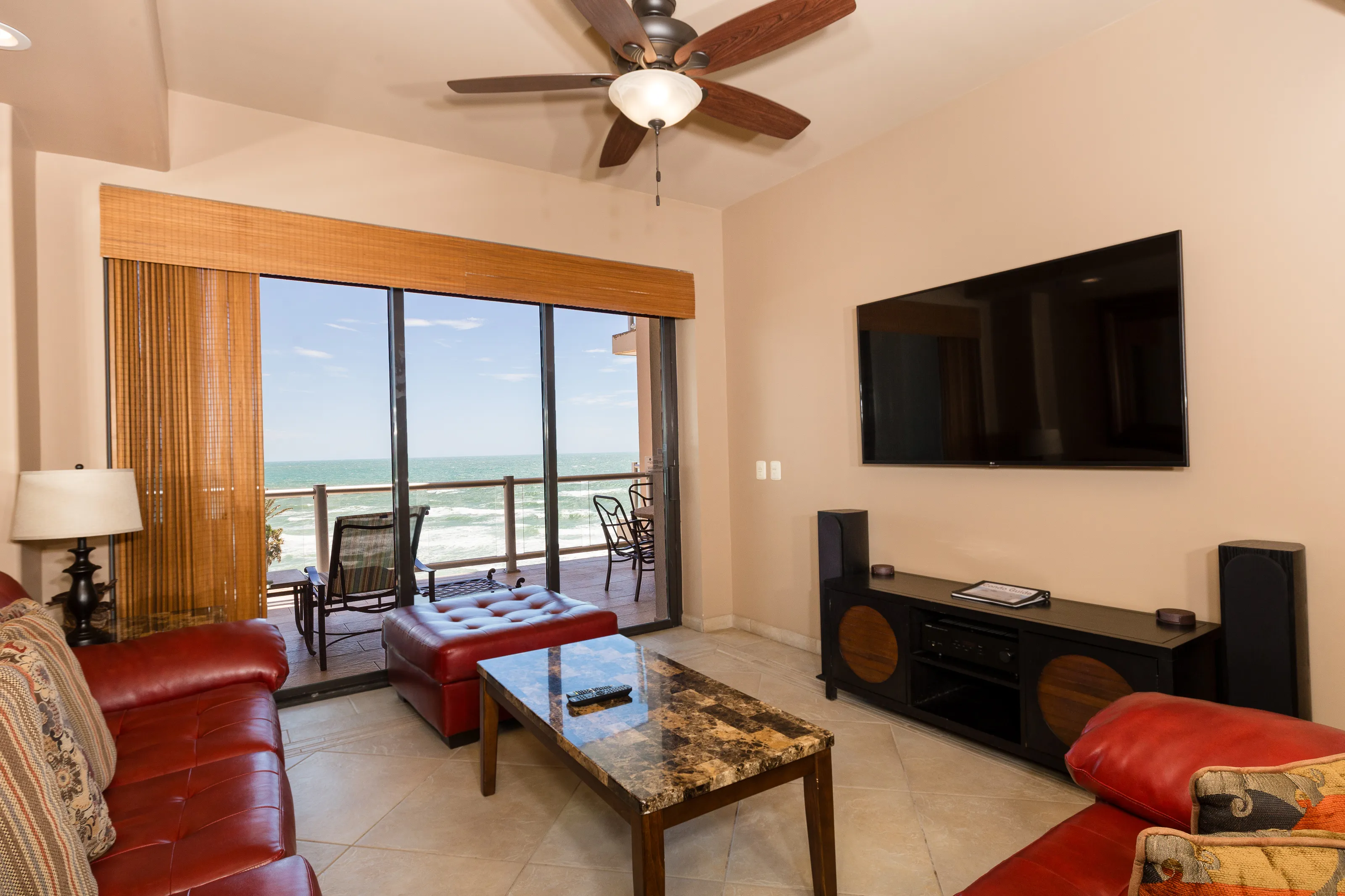 Cozy living room with ocean view and modern decor.